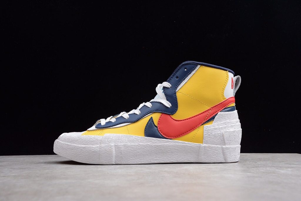 white and yellow nike blazers