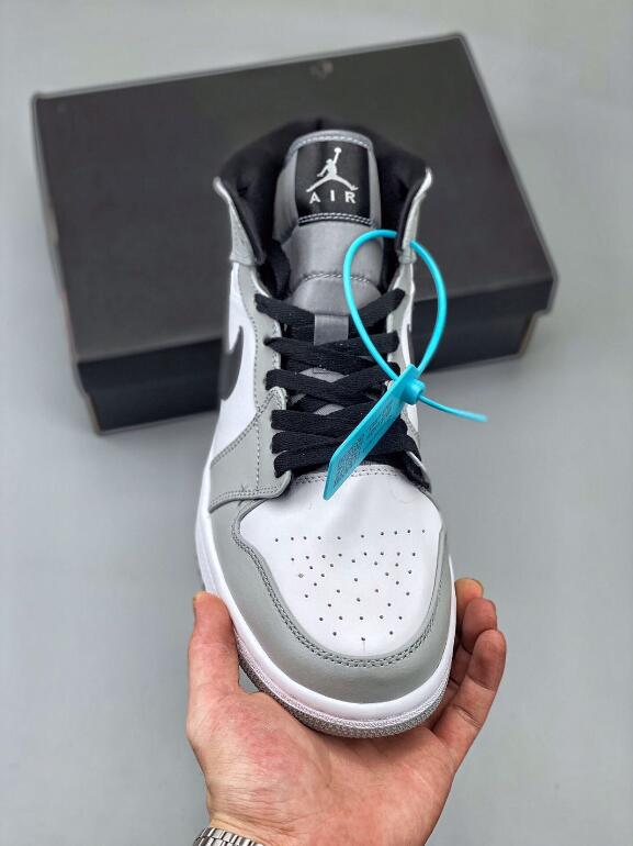 https://www.menairshoes.com/wp-content/uploads/2021/08/2021-Perfect-Outlet-Air-Jordan-1-Mid-Light-Smoke-Grey-Basketball-Sneaker-554724-092-2.jpg